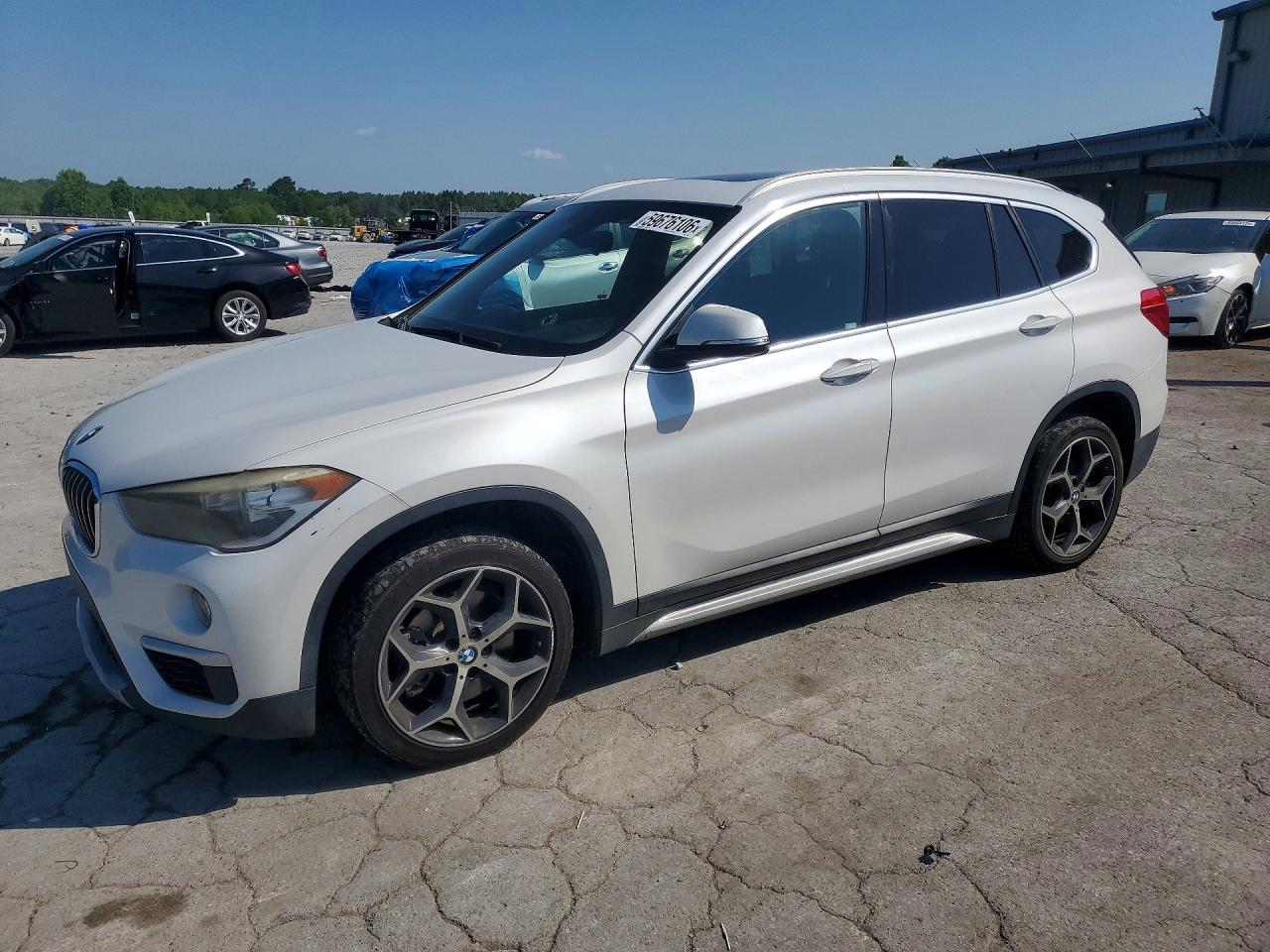 2018 BMW X1 sDrive28i, VIN WBXHU7C31J3F04553 — Normal wear