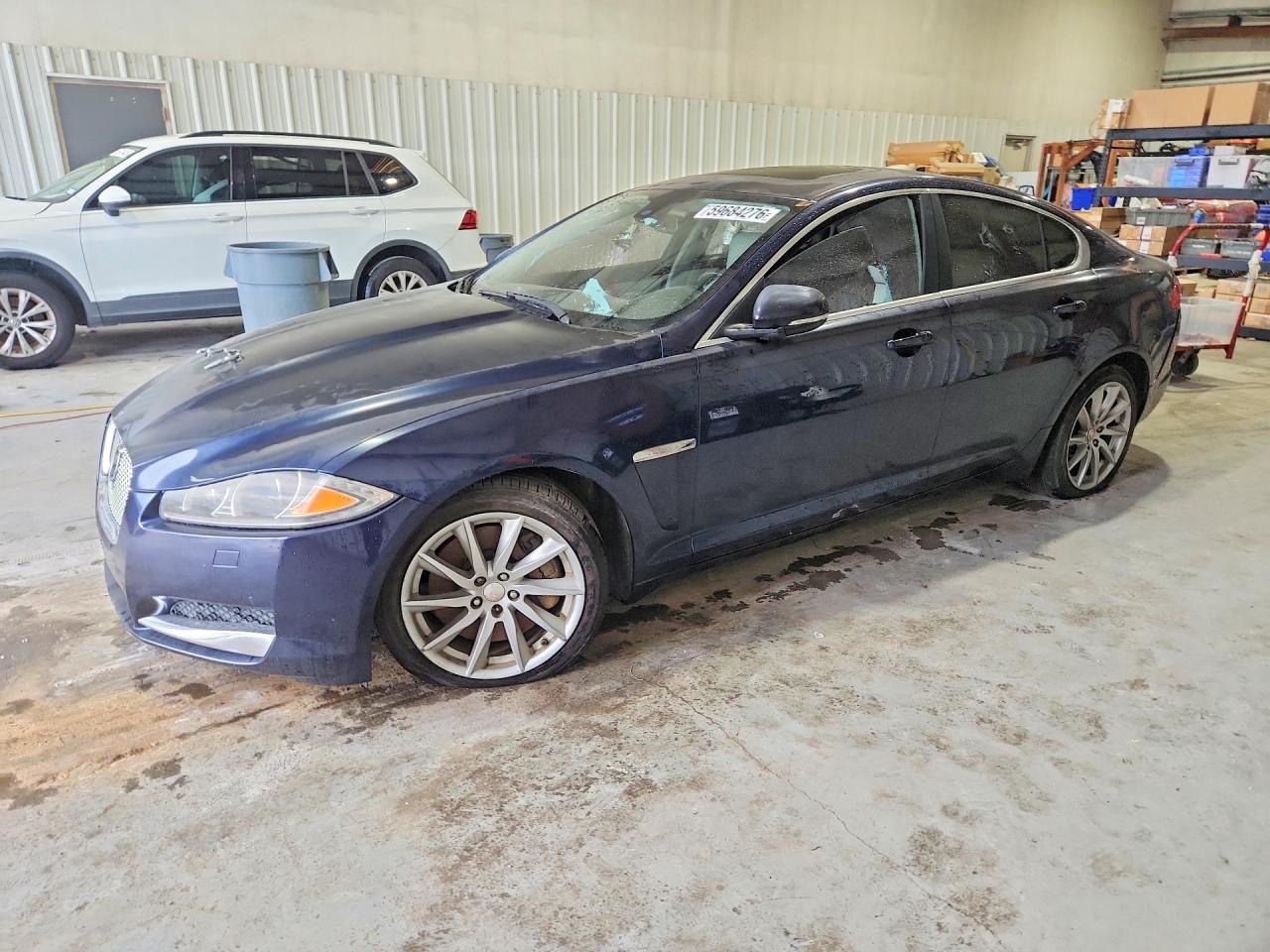 2015 Jaguar XF T Premium, VIN SAJWA0FS5FPU78822 — Vandalism