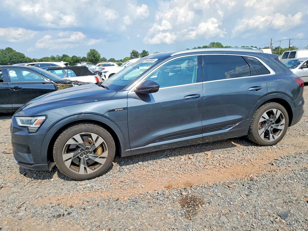 2021 Audi e-tron Premium, VIN WA1AAAGEXMB015215 — Side