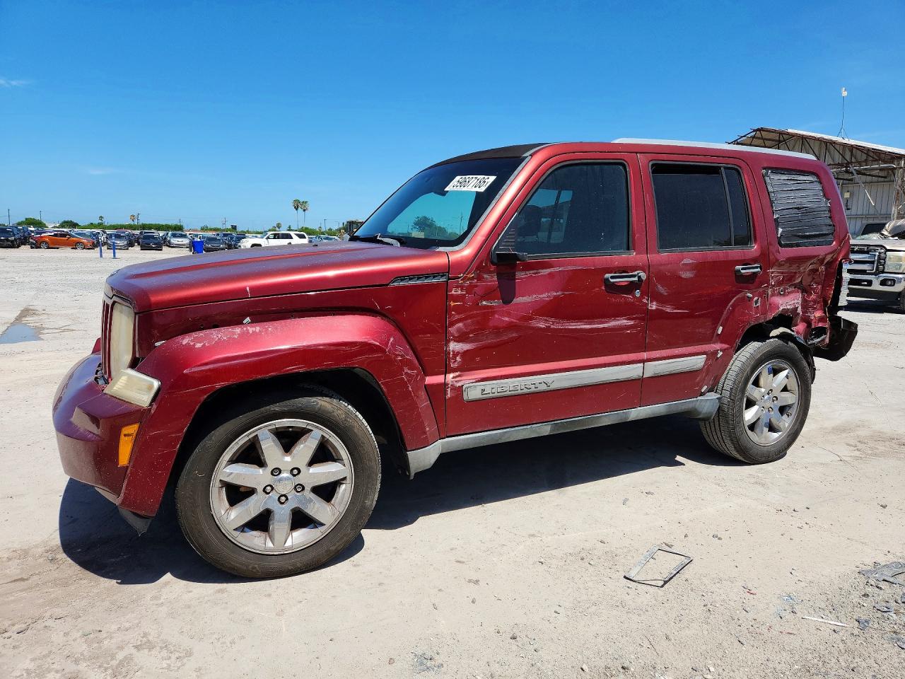 2012 Jeep Liberty Sport, VIN 1C4PJLAK7CW110879 — Зад