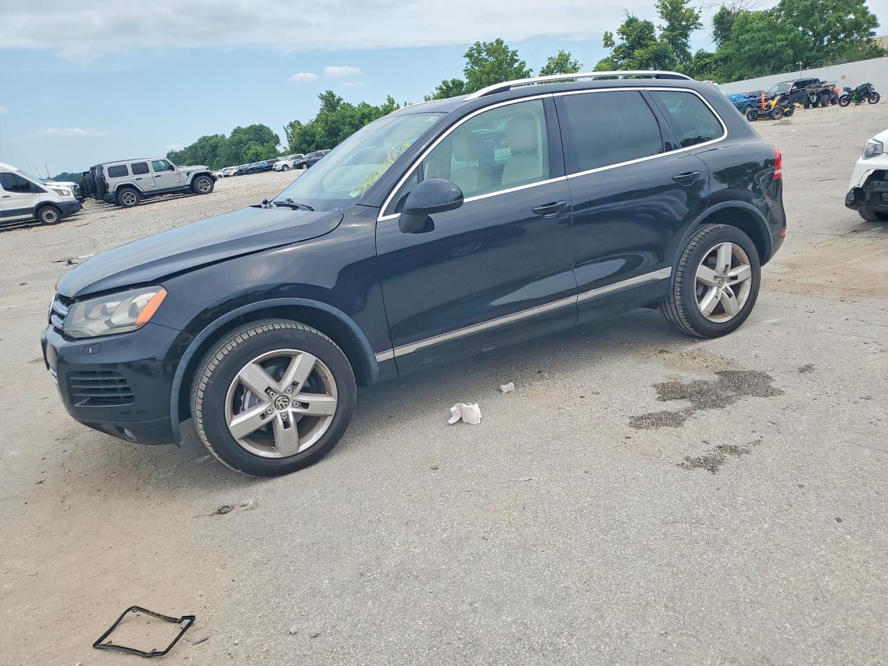 2014 Volkswagen Touareg Sport, VIN WVGEF9BP8ED014727 — Water / flood