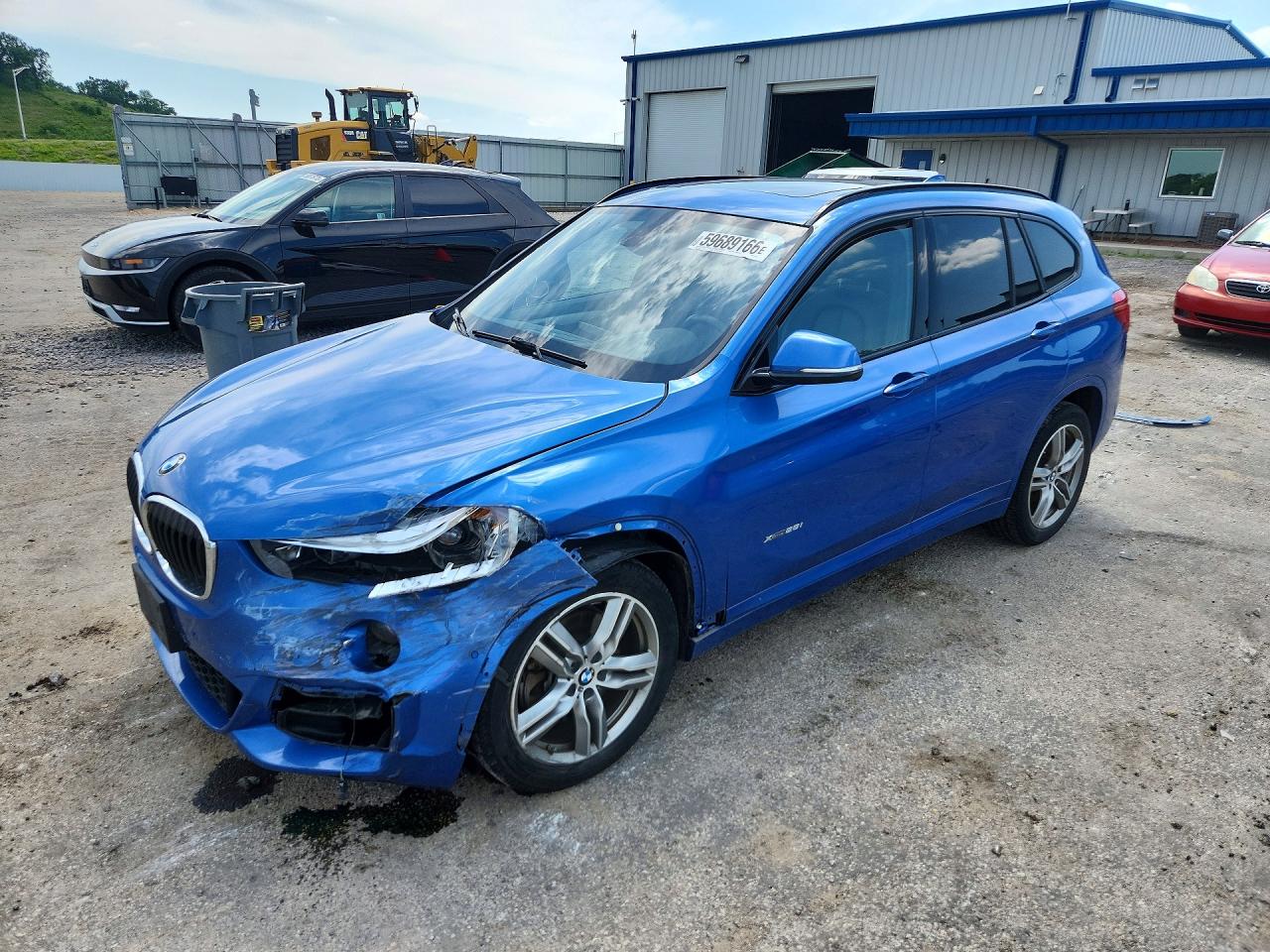 2018 BMW X1 xDrive28i, VIN WBXHT3C34J5L25873 — Front end
