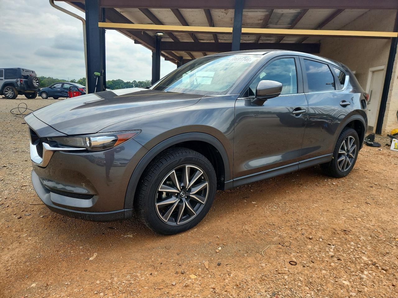 2018 Mazda CX-5 Touring, VIN JM3KFACMXJ1402851 — Stripped