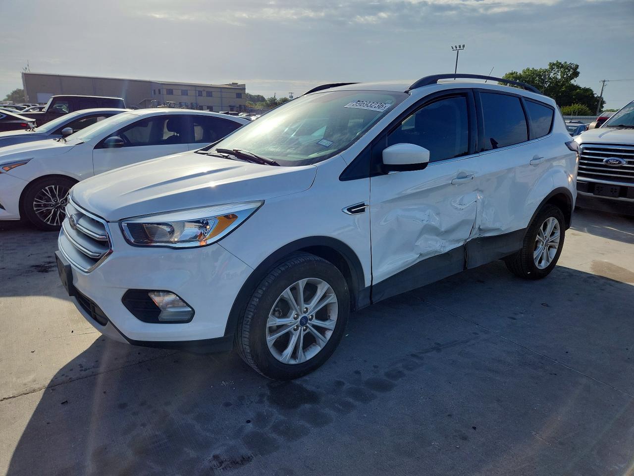 2018 Ford Escape SE, VIN 1FMCU0GD8JUD58835 — Side