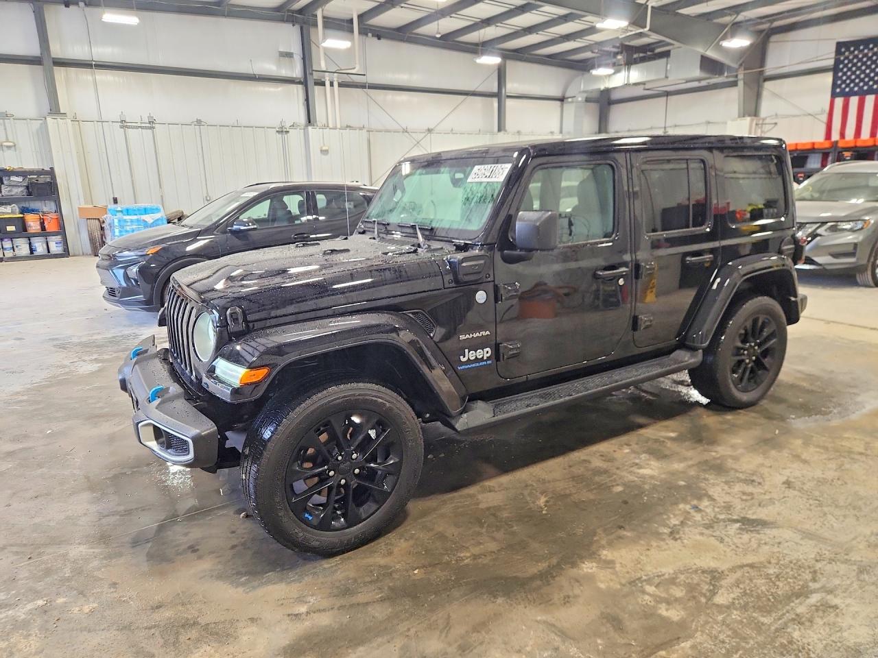 2023 Jeep Wrangler Sahara, VIN 1C4JJXP66PW513619 — Minor dents and scratches