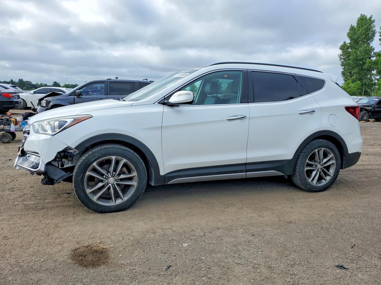 2017 Hyundai Santa Fe 2.0T, VIN 5XYZUDLA4HG471047 — Front end