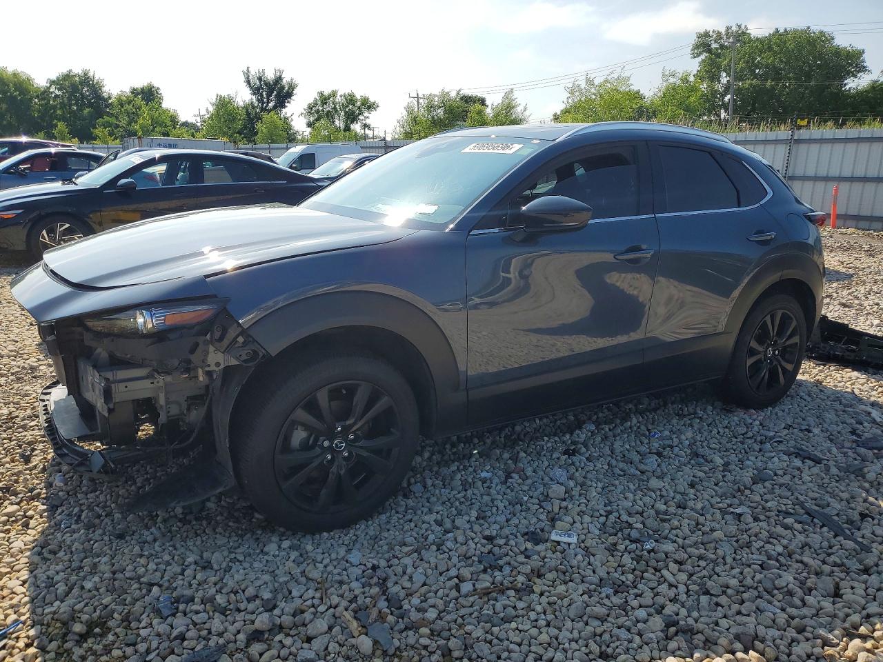2023 Mazda CX-30 Premium, VIN 3MVDMBDY8PM538422 — Front end