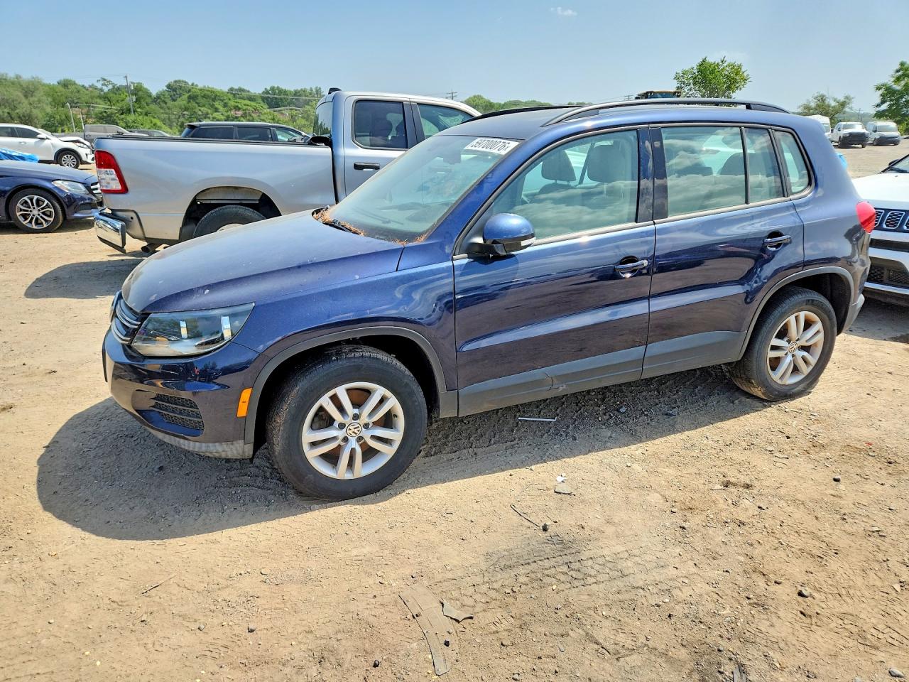 2016 Volkswagen Tiguan SEL, VIN WVGBV7AX8GW528645 — Vandalism