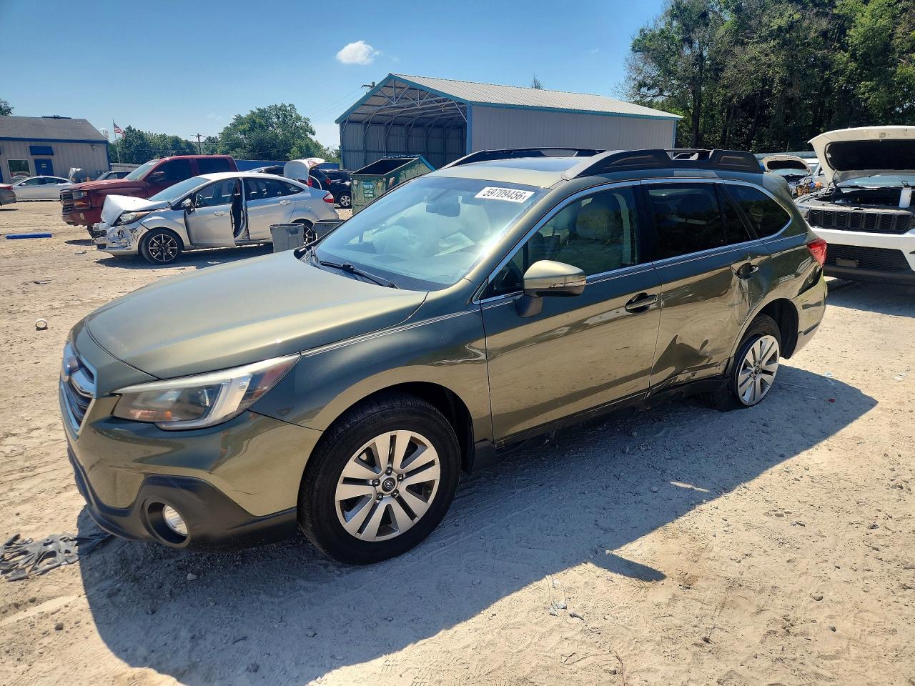 2019 Subaru Outback Premium, VIN 4S4BSAHC1K3332436 — Бок