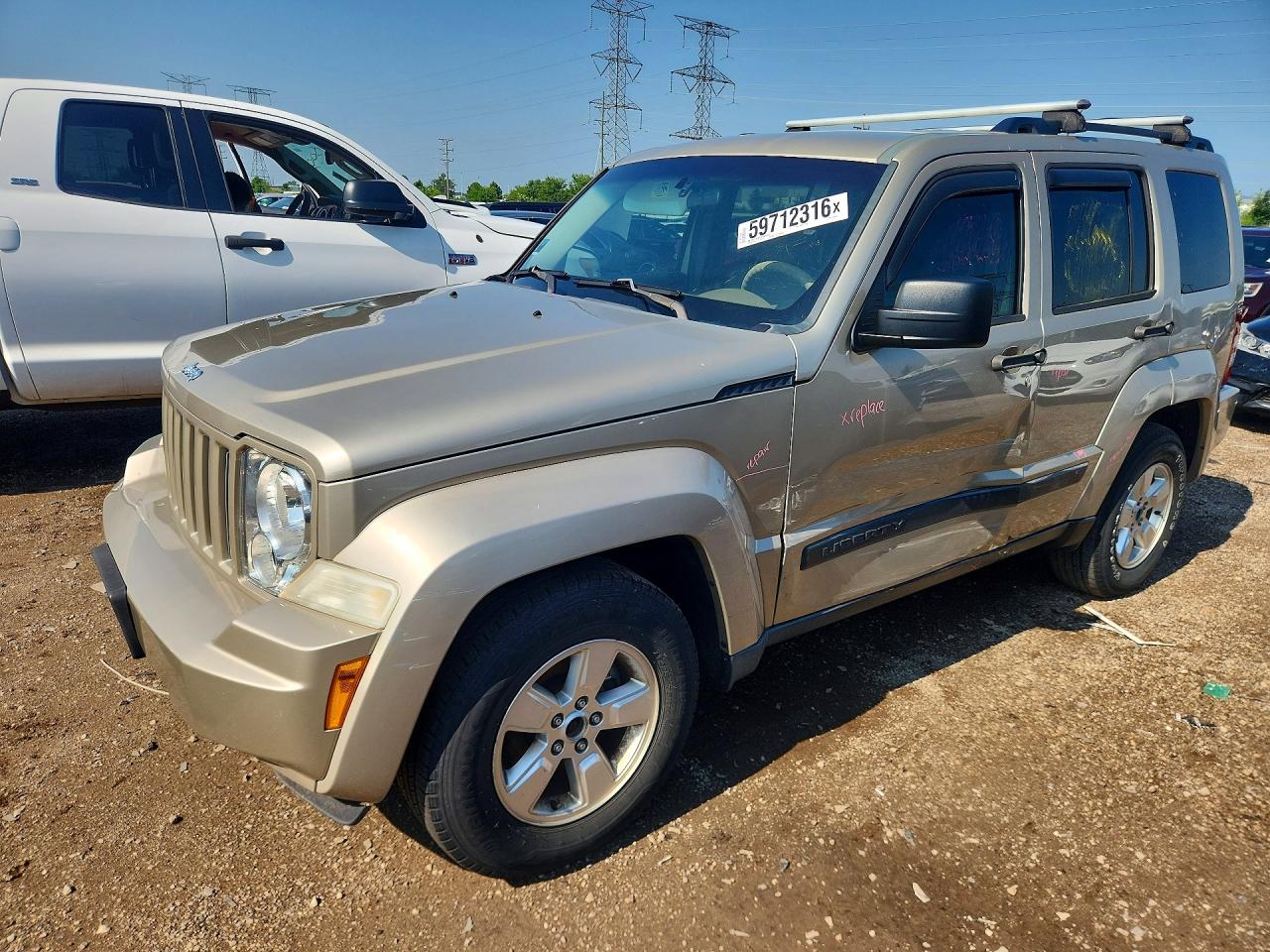 2010 Jeep Liberty Sport, VIN 1J4PN2GK7AW159805 — Side