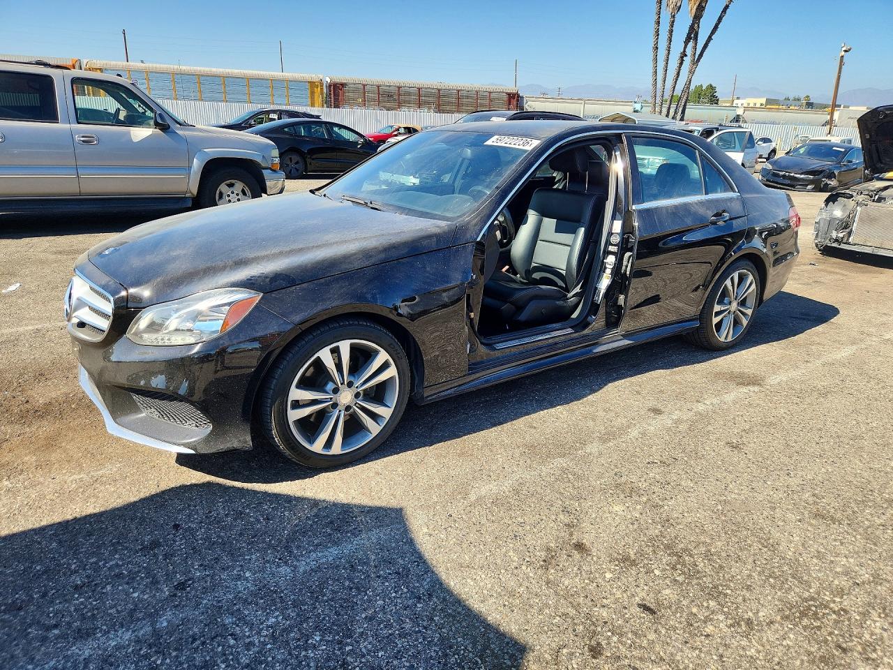 2016 Mercedes-Benz E 350 Luxury, VIN WDDHF5KB9GB200540 — Side