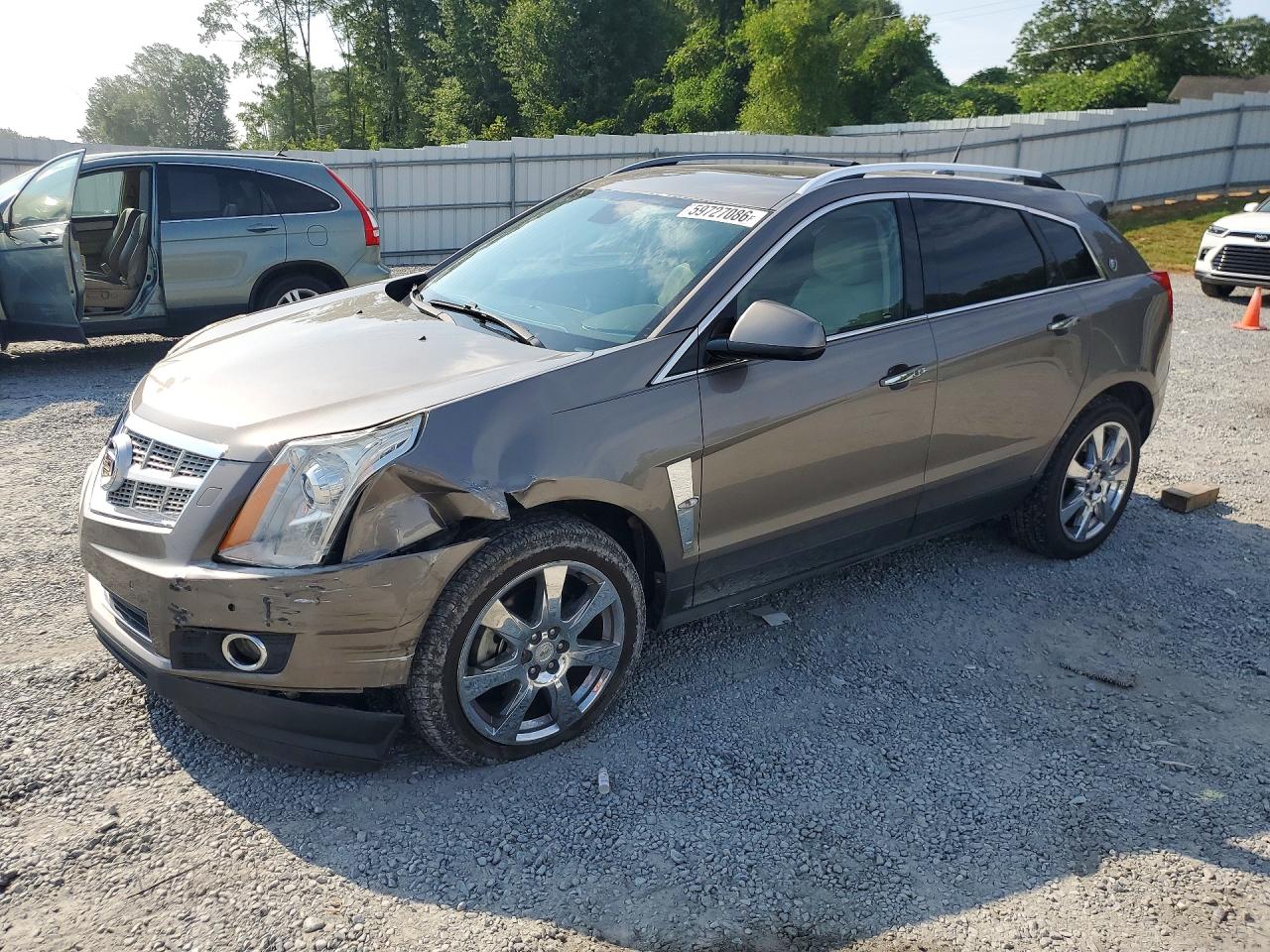 2012 Cadillac SRX Performance Collection, VIN 3GYFNBE32CS602626 — Front end
