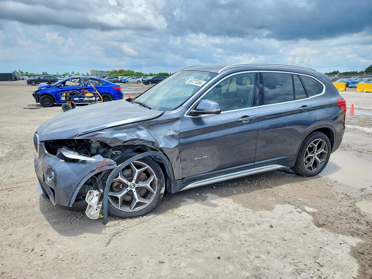 2018 BMW X1 sDrive28i, VIN WBXHU7C3XJ5H45838 — Front end