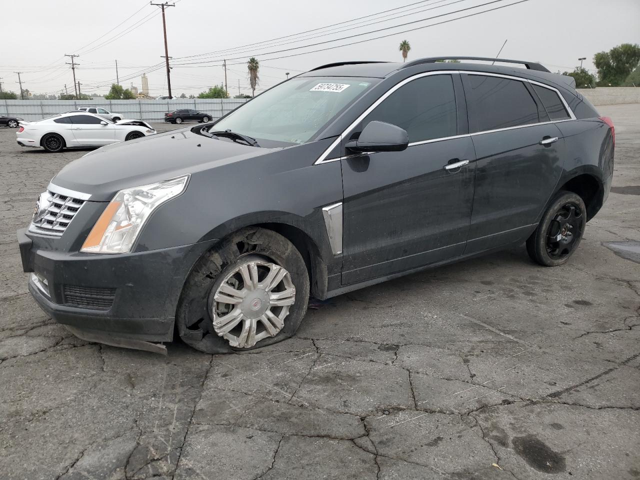 2016 Cadillac SRX, VIN 3GYFNAE34GS520574 — Auction photo