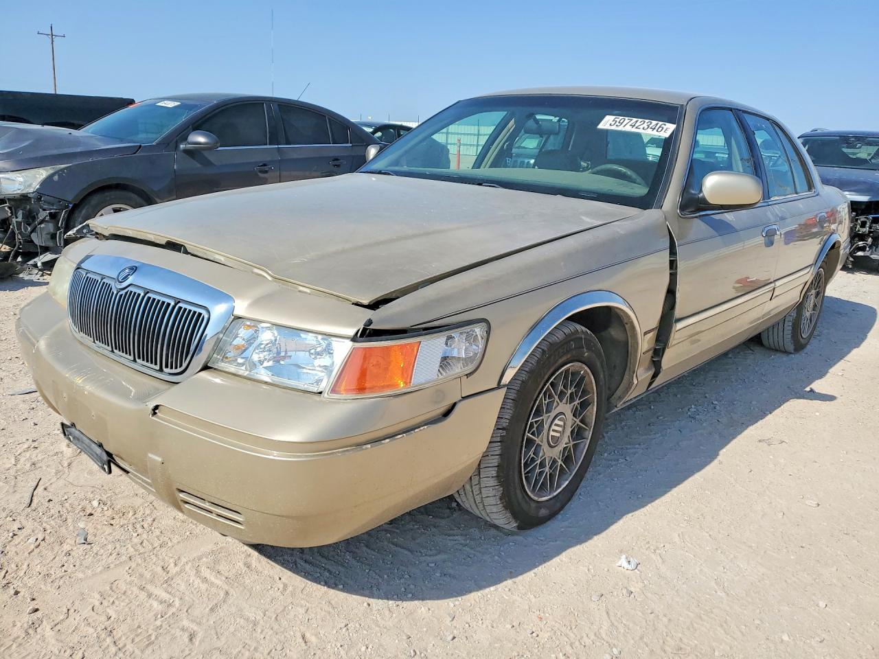 1999 Mercury Grand Marquis GS, VIN 2MEFM74W6XX617967 — Front end