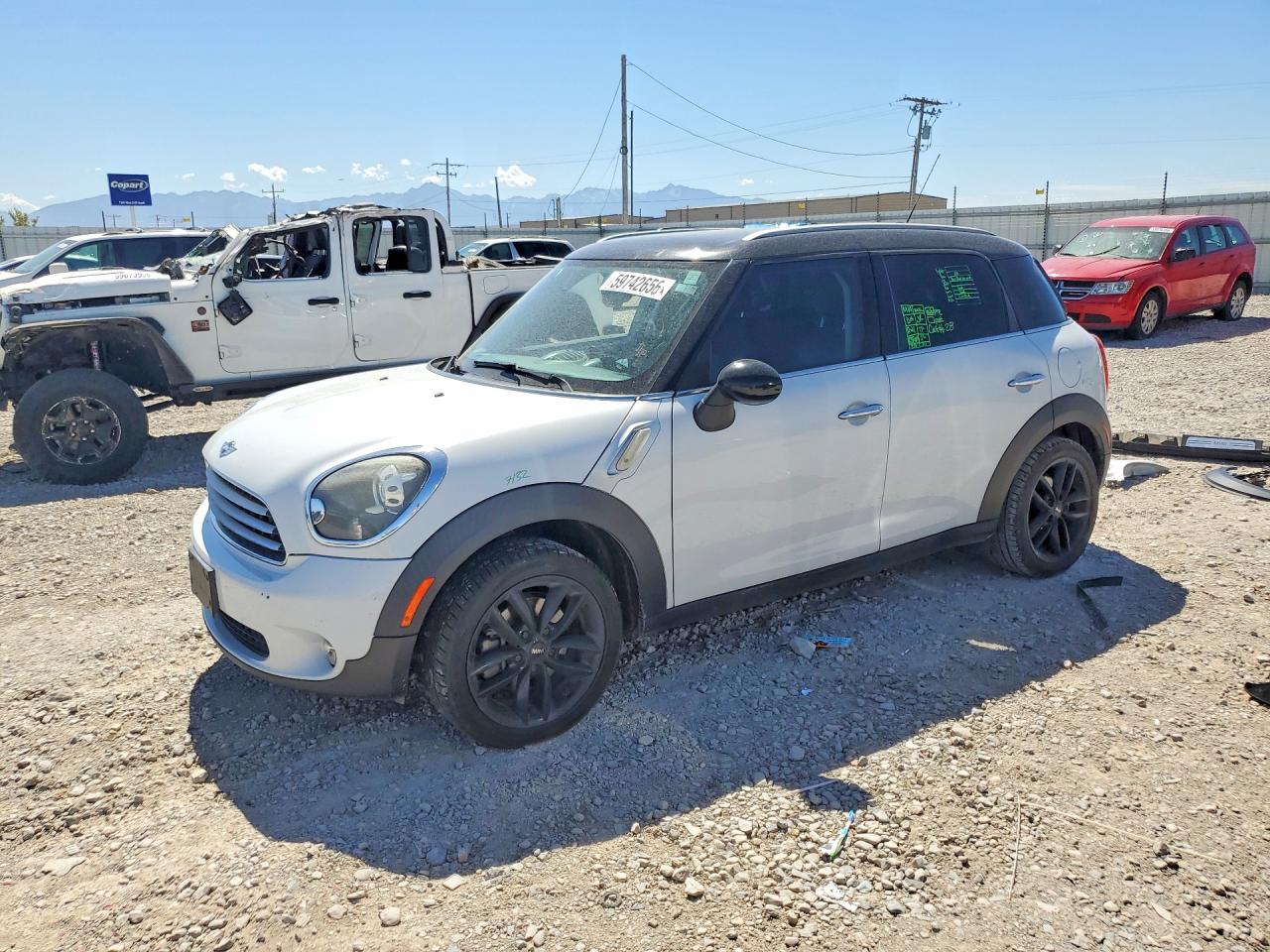 2014 MINI Countryman, VIN WMWZB3C57EWM32645 — Side