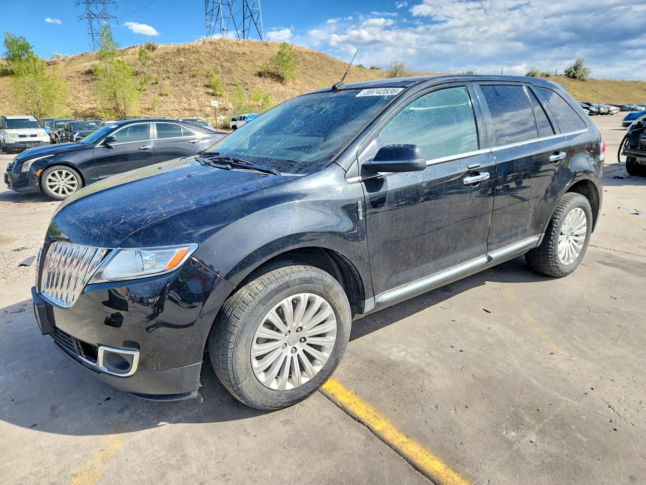 2011 Lincoln MKX, VIN 2LMDJ6JK5BBJ26034 — Side