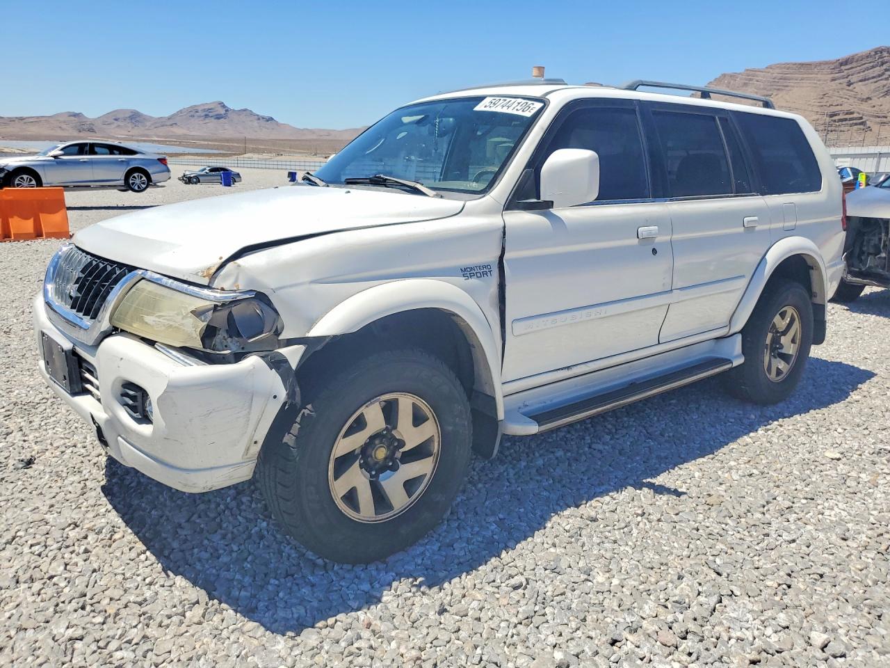 2001 Mitsubishi Montero Sport Limited, VIN JA4LS41R91P001727 — Перед