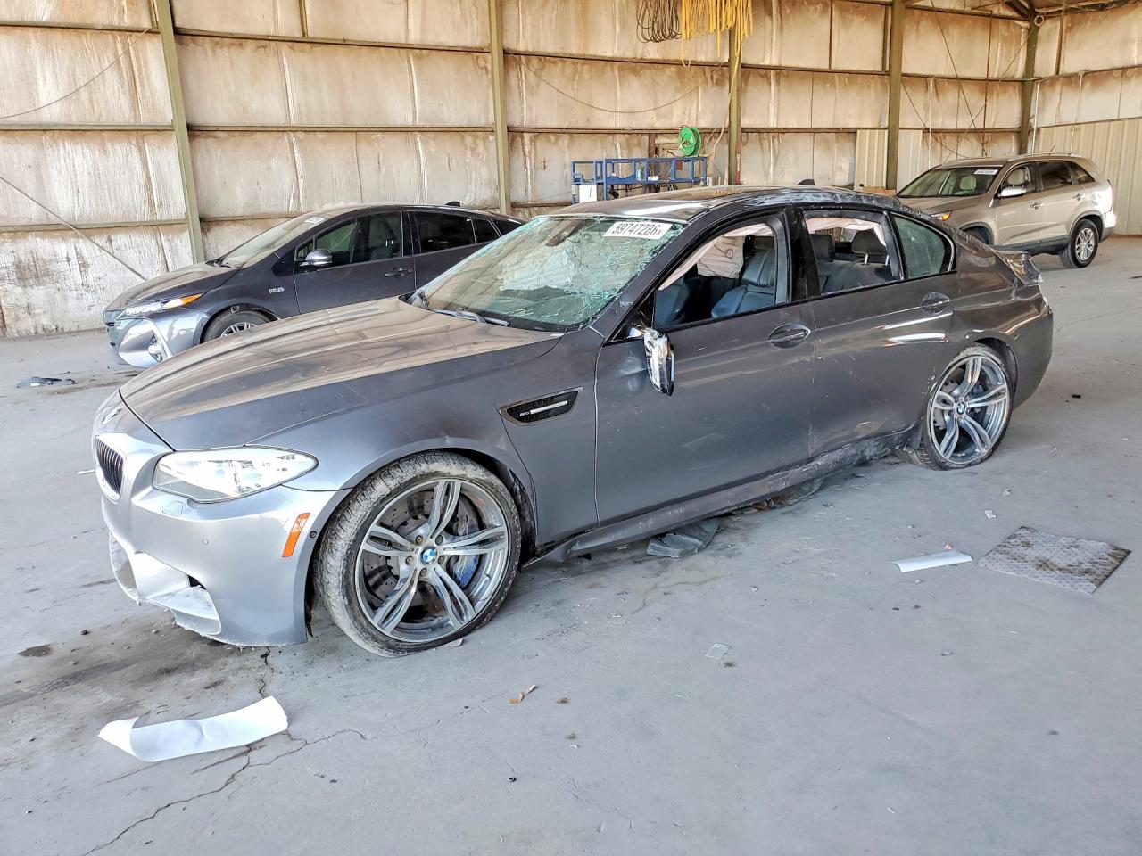 2013 BMW M5, VIN WBSFV9C51DD096994 — Опрокидывание