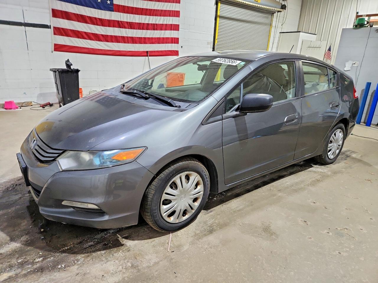 2011 Honda Insight, VIN JHMZE2H35BS008247 — Обычный износ