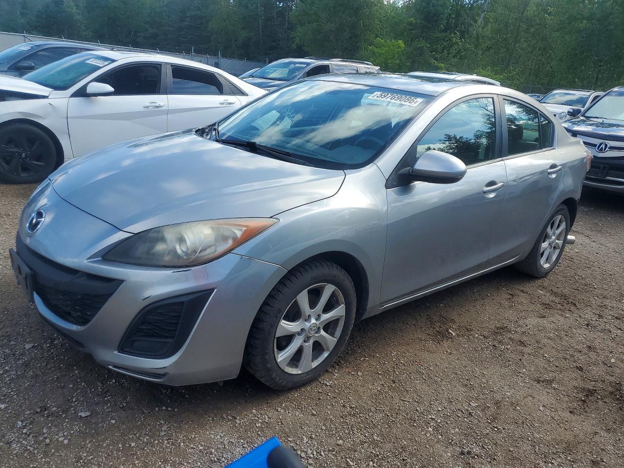 2011 Mazda 3 i Touring, VIN JM1BL1VF5B1480164 — Rear end