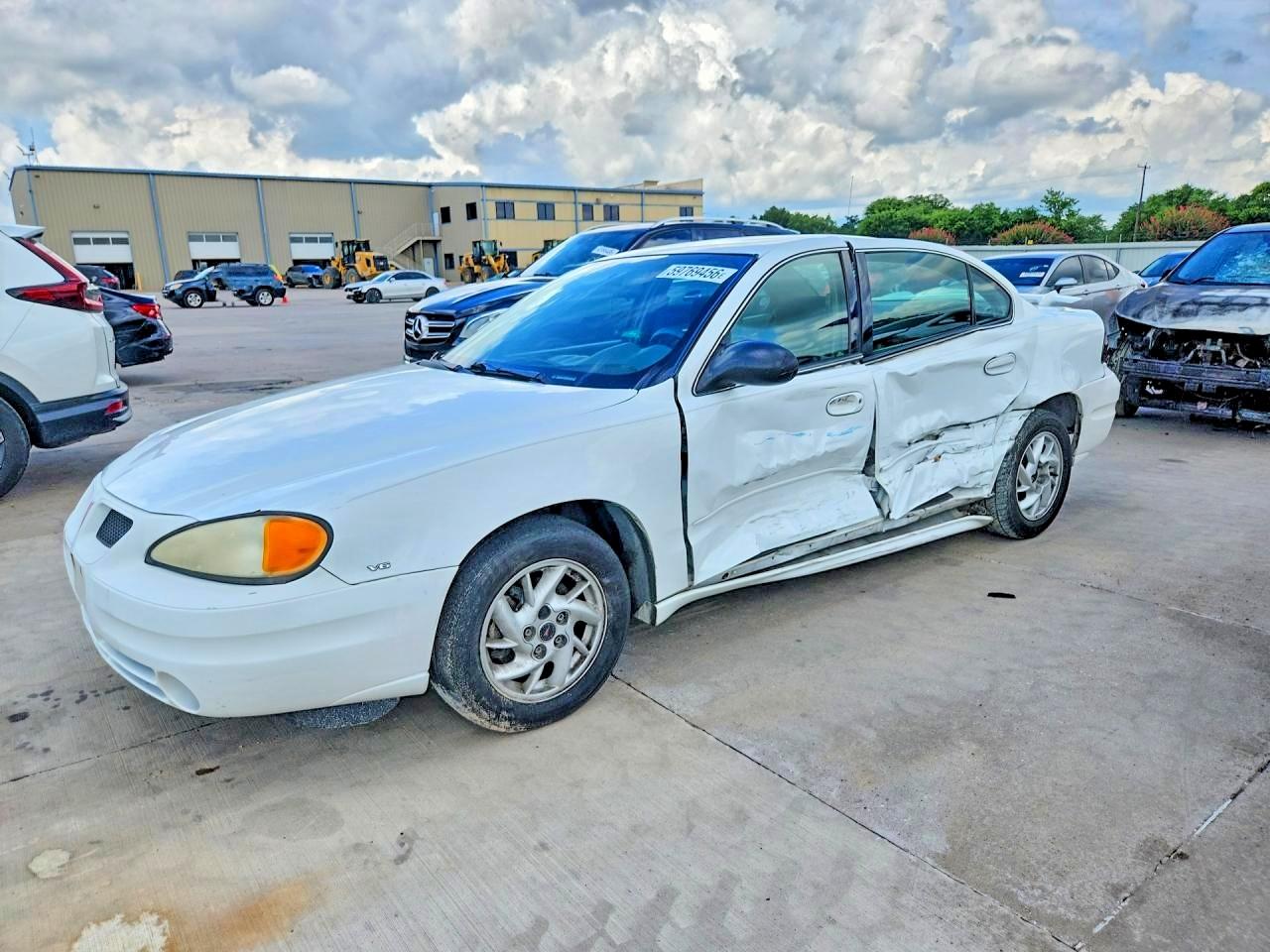 2004 Pontiac Grand Am SE1, VIN 1G2NF52E94C233121 — Side