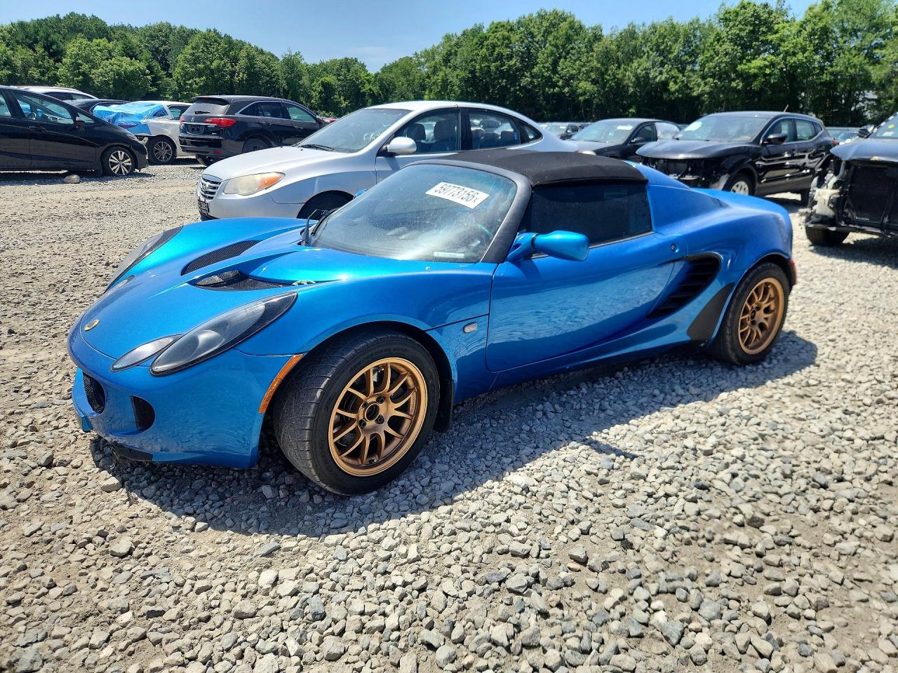 2006 Lotus Elise, VIN SCCPC11126HL30539 — Зад