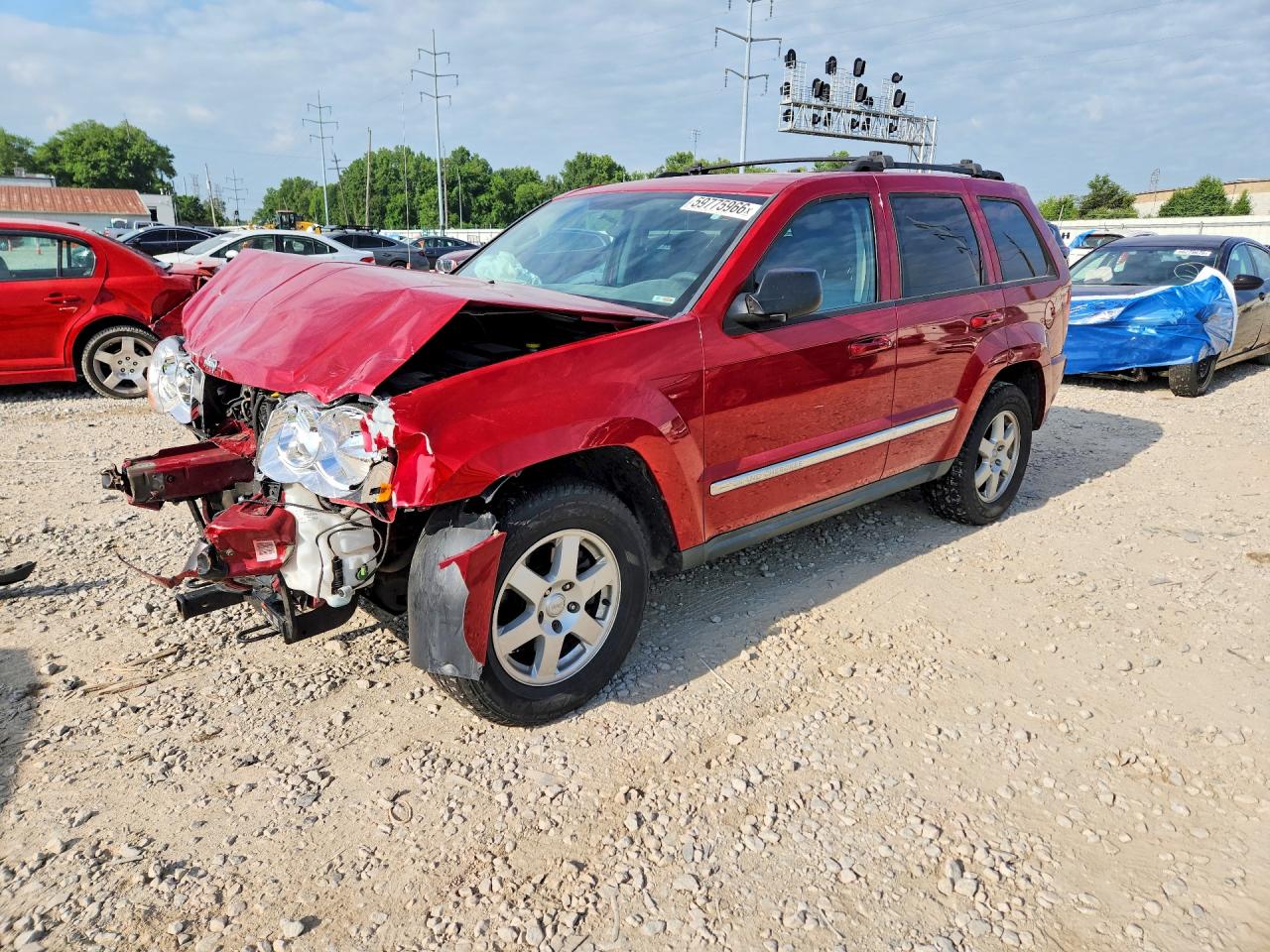 2010 Jeep Grand Cherokee Laredo, VIN 1J4PR4GK7AC115174 — Front end
