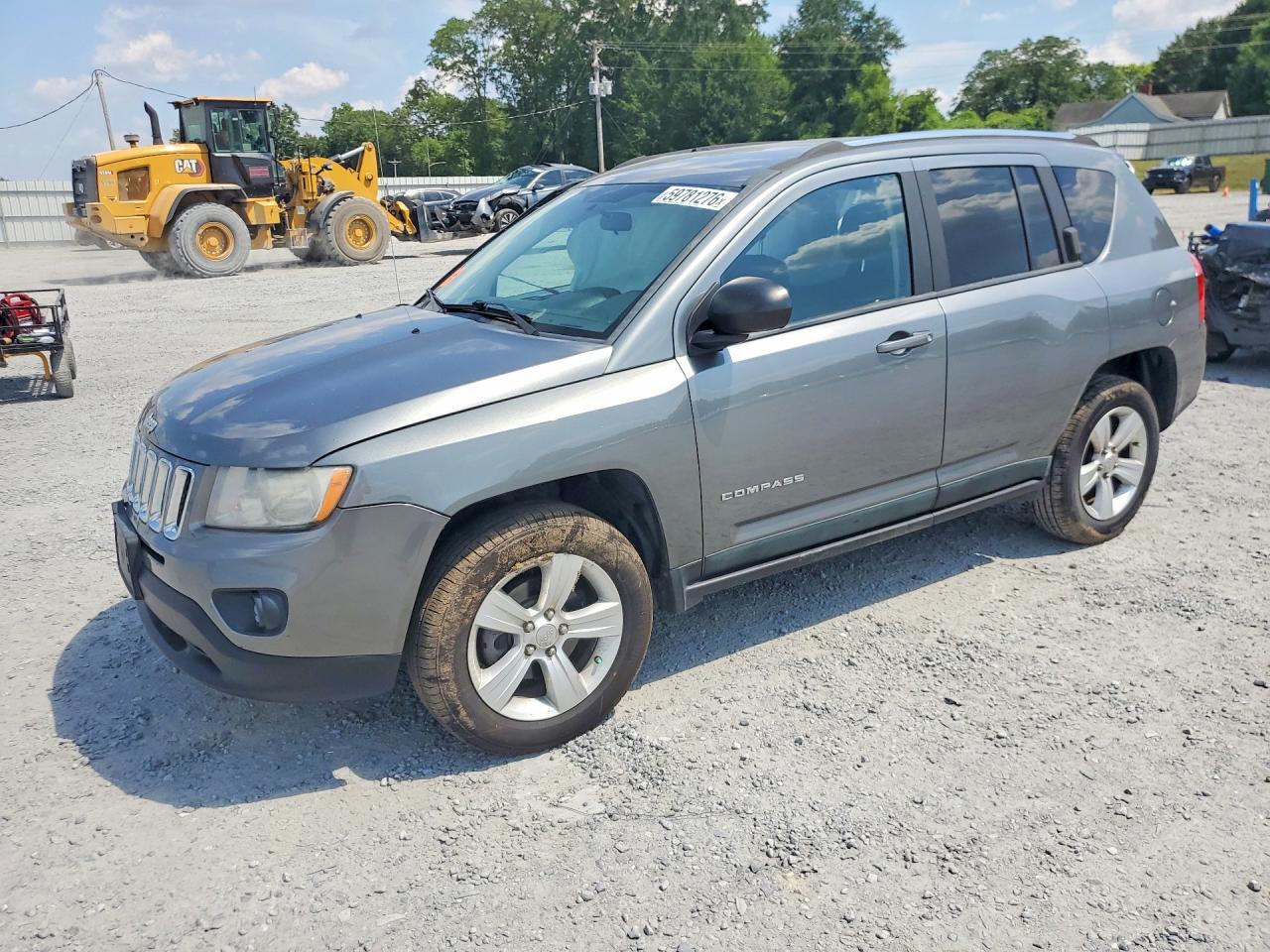 2011 Jeep Compass Latitude, VIN 1J4NF1FB1BD263851 — Side