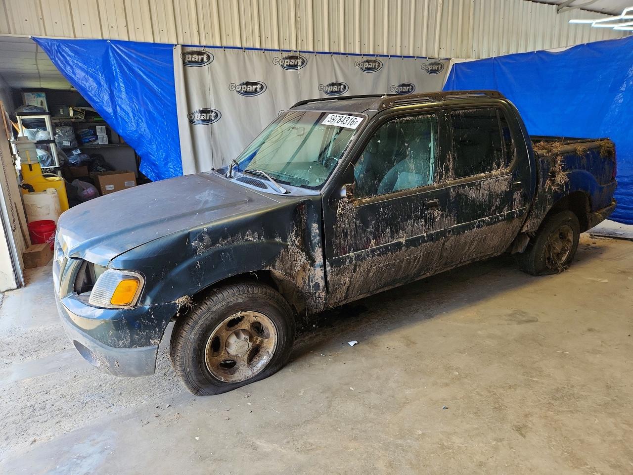 2004 Ford Explorer Sport Trac XLS, VIN 1FMZU67K54UB93858 — Rollover