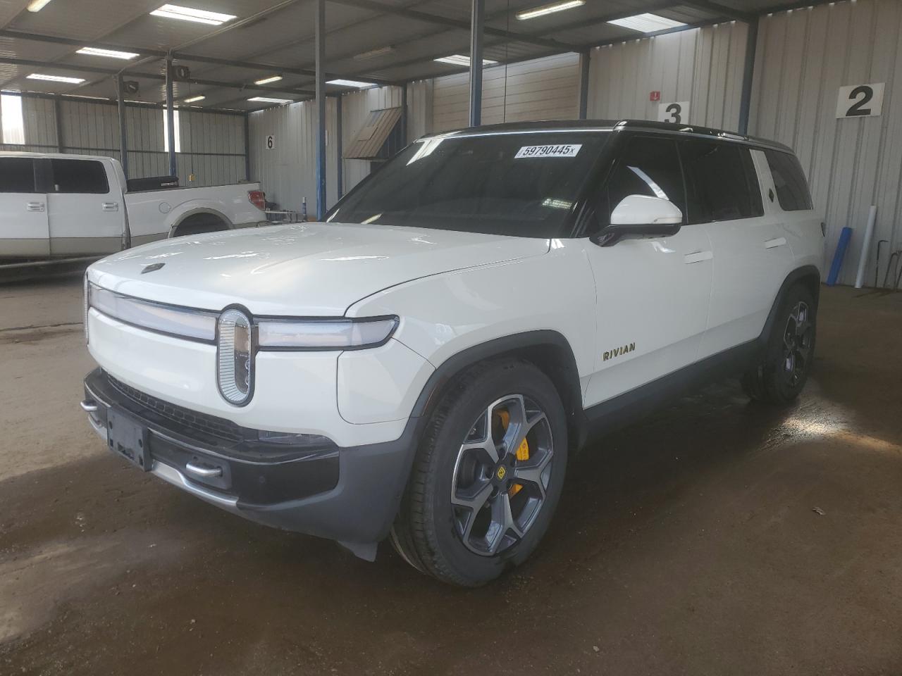 2023 Rivian R1S Adventure, VIN 7PDSGABA1PN021347 — Hail