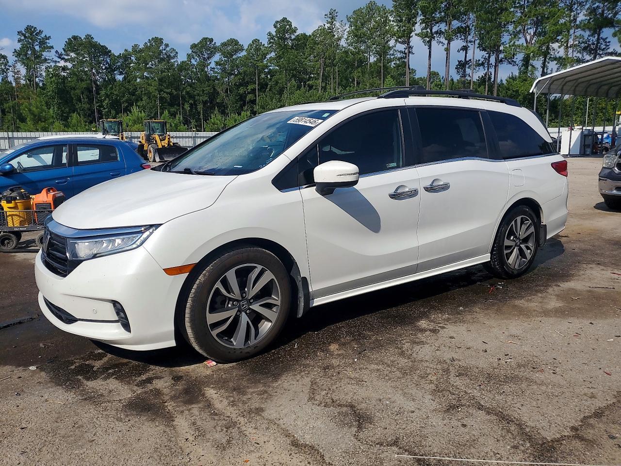 2023 Honda Odyssey Touring, VIN 5FNRL6H80PB022202 — Side