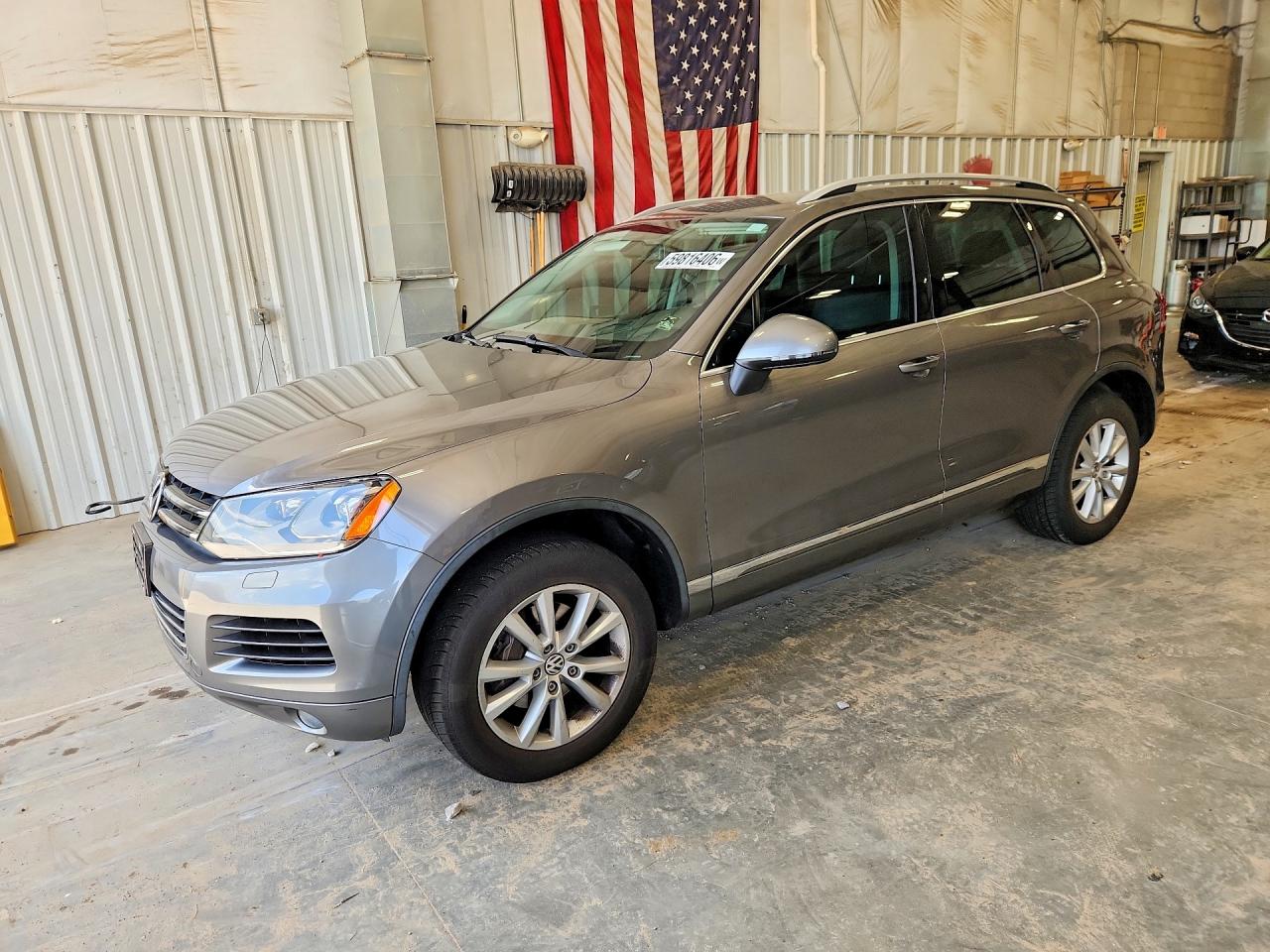 2014 Volkswagen Touareg Sport, VIN WVGEF9BP9ED004241 — Hail