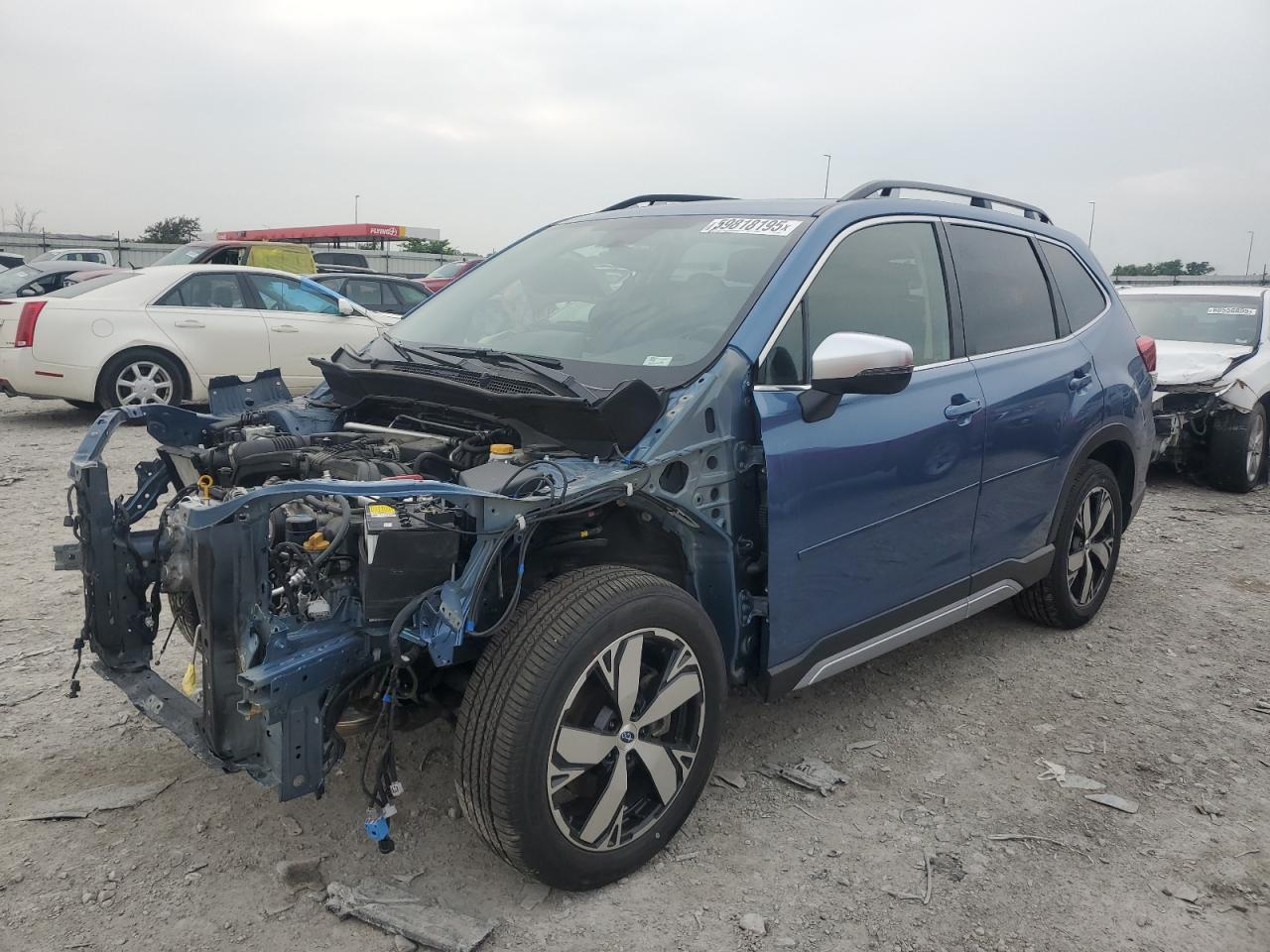 2021 Subaru Forester Touring, VIN JF2SKAXC6MH486010 — Partial repair