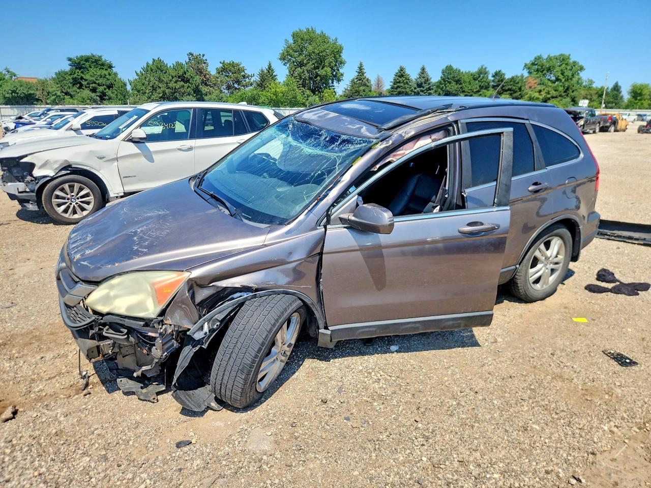 2011 Honda CR-V EX-L, VIN 5J6RE4H71BL076730 — Rollover