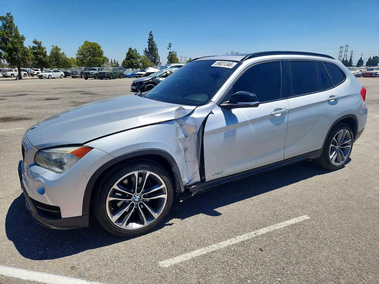 2015 BMW X1 xDrive28i, VIN WBAVL1C58FVY38201 — Front end