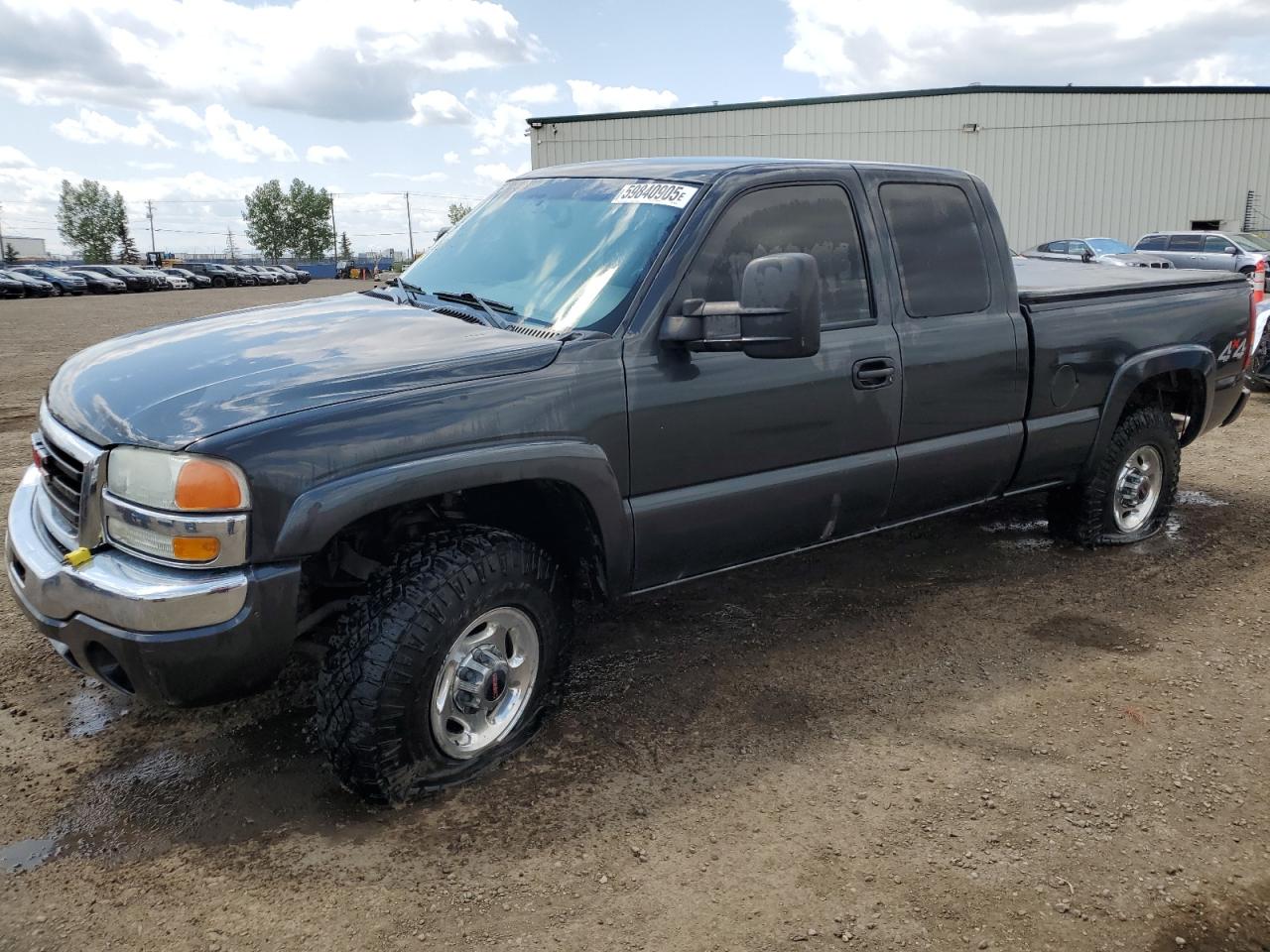 2003 GMC Sierra 2500 SLE, VIN 1GTGK29U13Z307445 — Vandalism