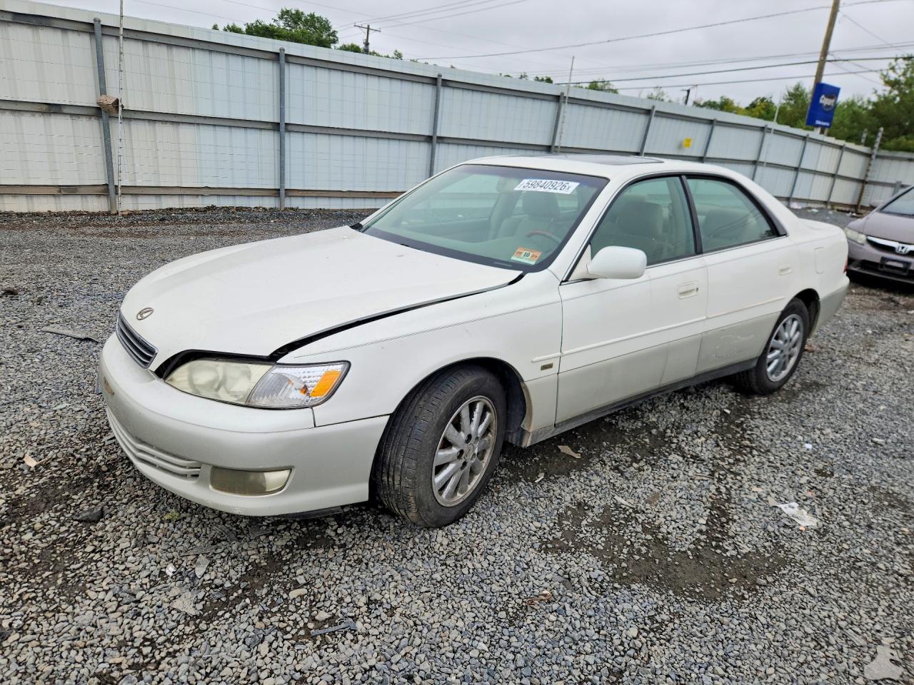2001 Lexus ES 300, VIN JT8BF28G810321658 — Бок