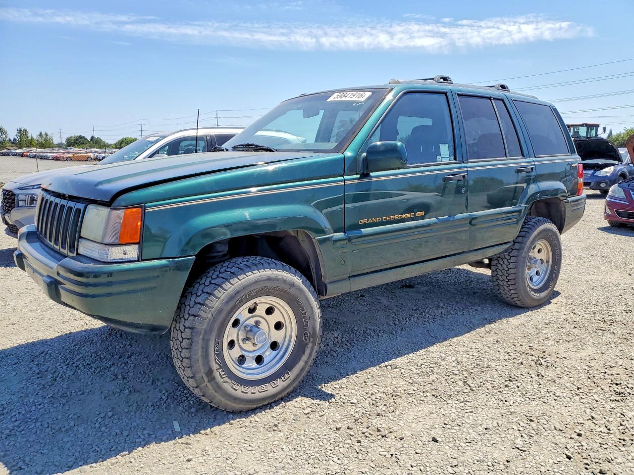 1996 Jeep Grand Cherokee Limited, VIN 1J4GZ78Y3TC373649 — Minor dents and scratches