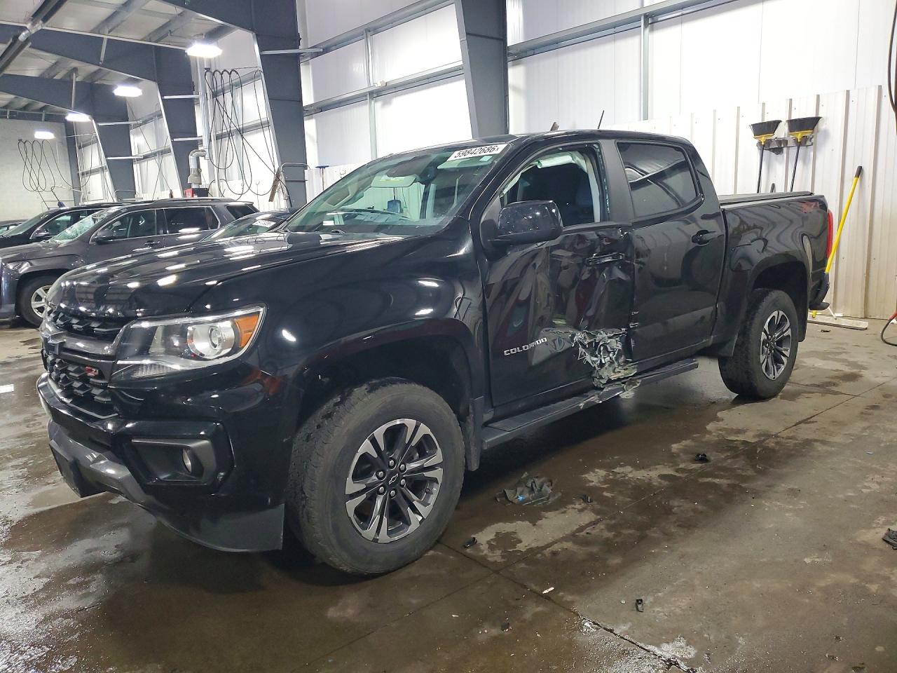 2021 Chevrolet Colorado 4WD Z71, VIN 1GCGTDEN0M1234222 — Side