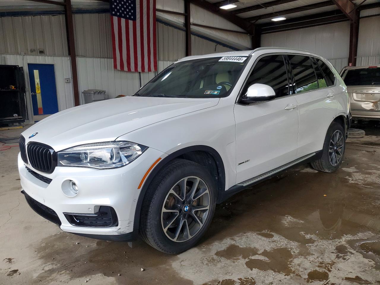 2018 BMW X5 xDrive35i, VIN 5UXKR0C52J0X99690 — Rear end
