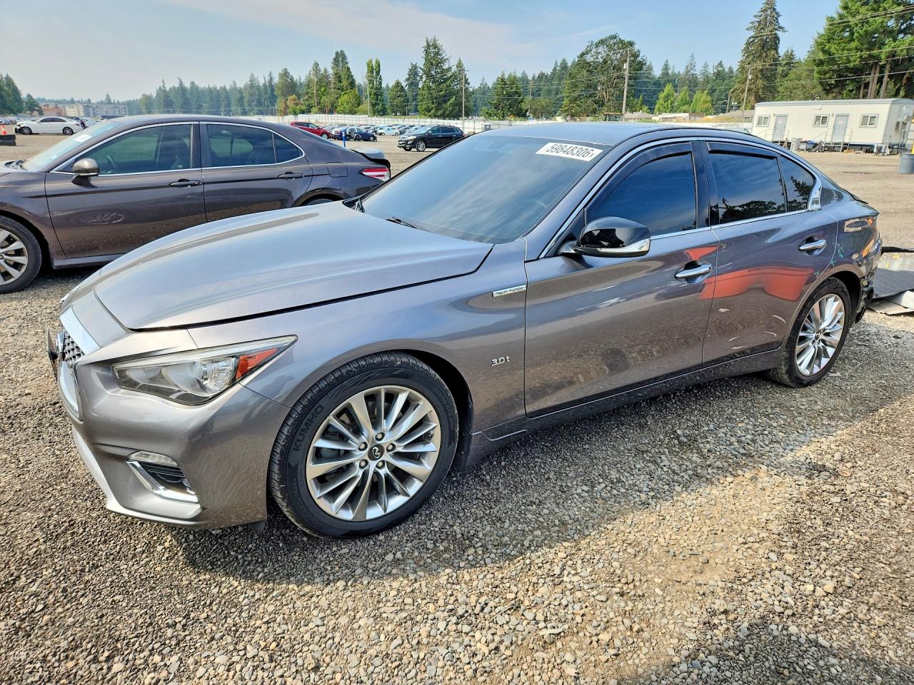 2019 Infiniti Q50 Signature Edition, VIN JN1EV7AR7KM556785 — Rear end