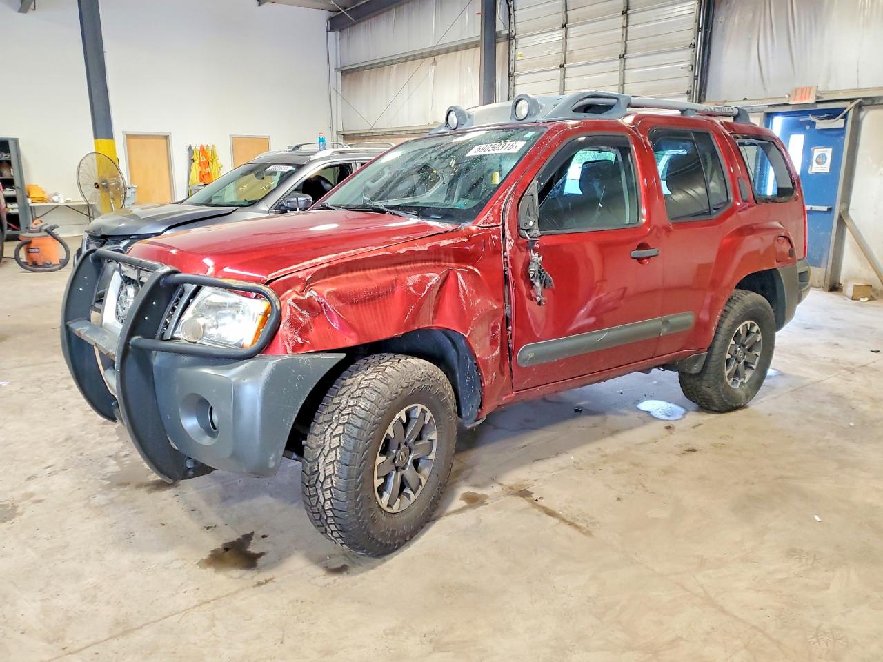 2015 Nissan Xterra Pro-4X, VIN 5N1AN0NWXFN658953 — Rollover
