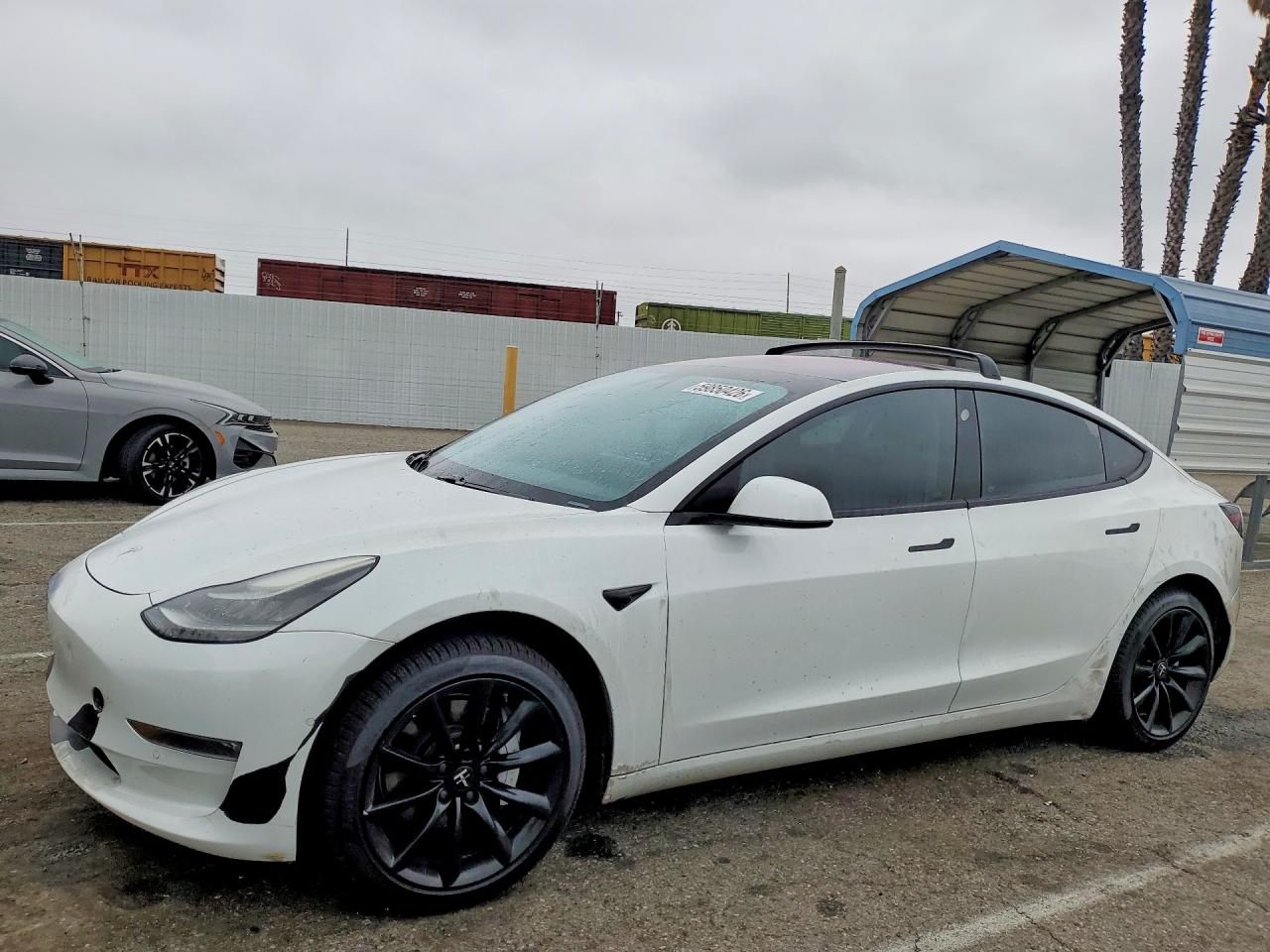 2018 Tesla Model 3 Long Range Battery, VIN 5YJ3E1EA8JF005813 — Rear end