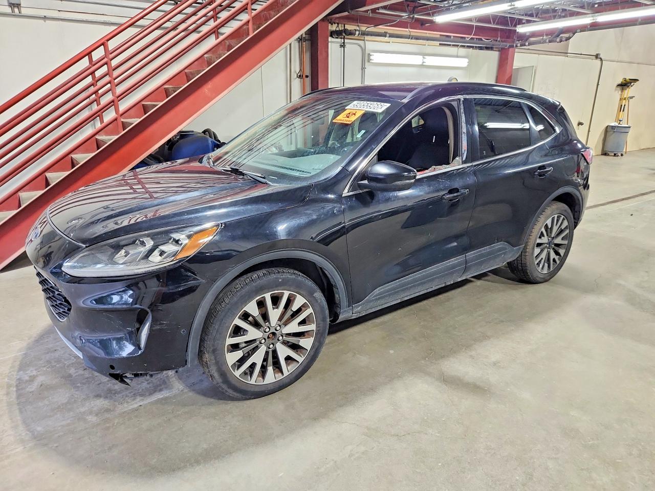 2020 Ford Escape Titanium, VIN 1FMCU9J94LUB16278 — Biohazard / chemical