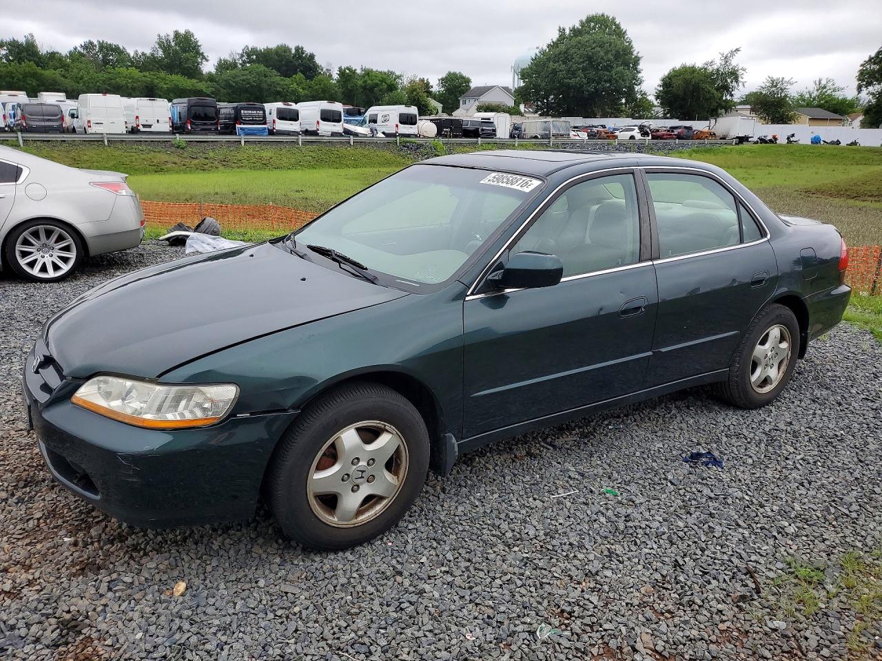 1999 Honda Accord EX, VIN 1HGCG1654XA024521 — Side