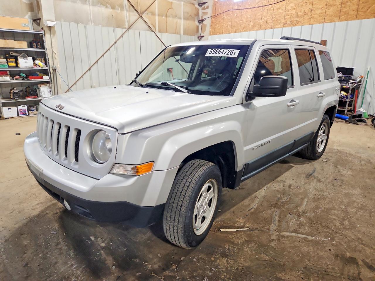 2012 Jeep Patriot Sport, VIN 1C4NJRBB2CD506920 — Side