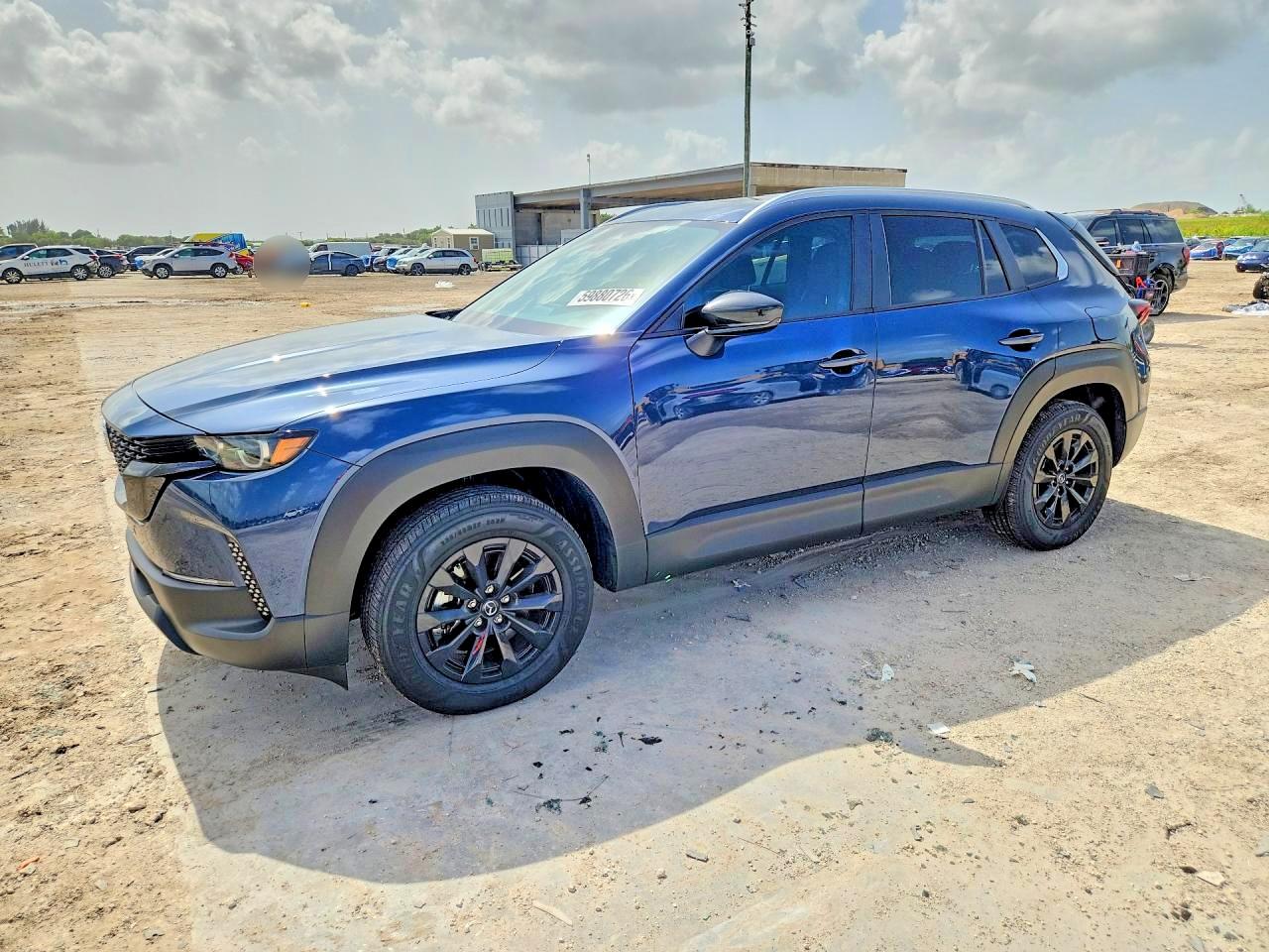 2026 Mazda CX-50 Hybrid Preferred, VIN 7MMVAABW4TN165485 — Зад