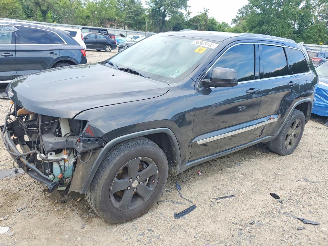 2011 Jeep Grand Cherokee Laredo, VIN 1J4RR4GG0BC738674 — Front end