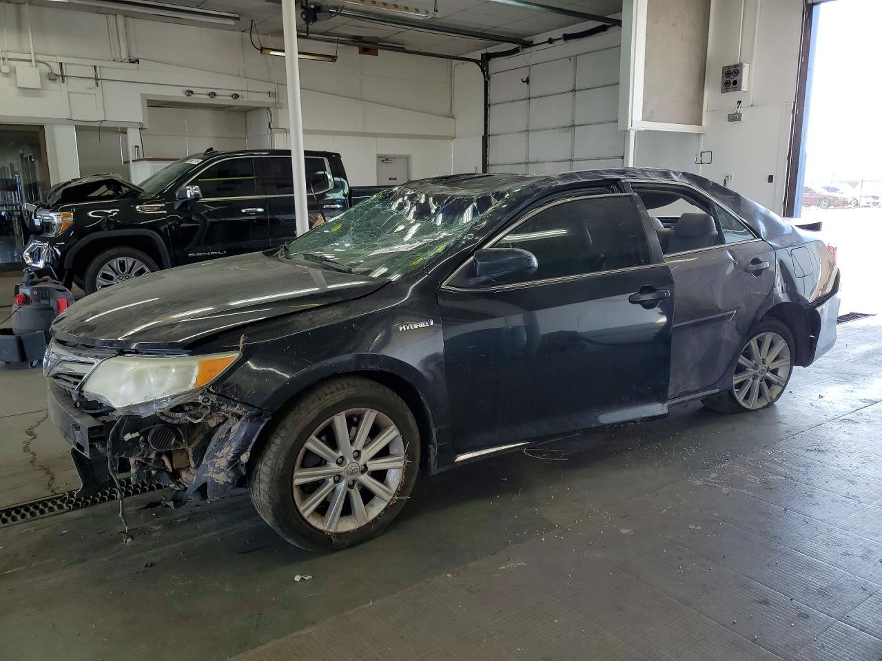 2012 Toyota Camry XLE, VIN 4T1BD1FK7CU012151 — Rollover